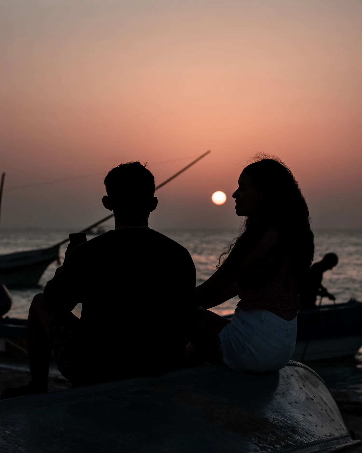 Couple watching the sunset in Sri Lanka